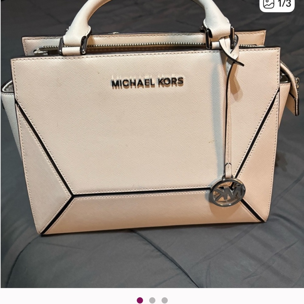 Michael Kors White Handbag and wristlet sold together $55